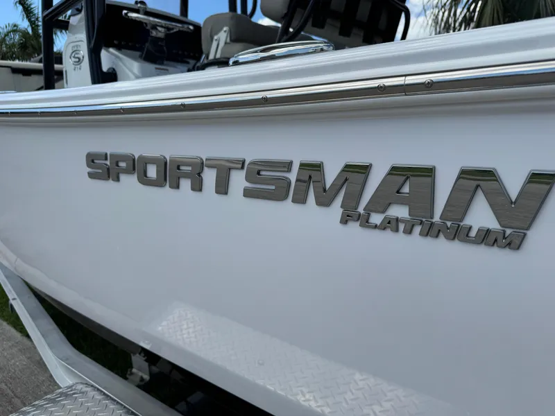 Slide: The Image of 2023 Sportsman Open 212 Center Console boat with "Sportsman Platinum" logo. - 5