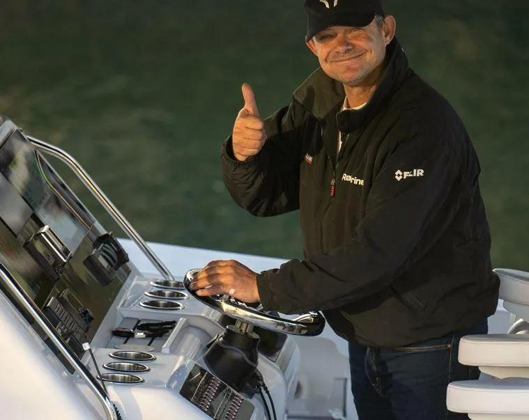 Slide: The Image of Man giving thumbs up on Hammer Yachts HammerCat 35, 2025 model. - 14