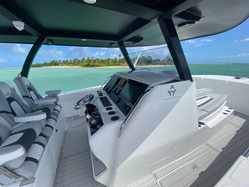 Slide: The Image of 2025 Hammer Yachts HammerCat 35 cockpit with ocean view and modern controls. - 6