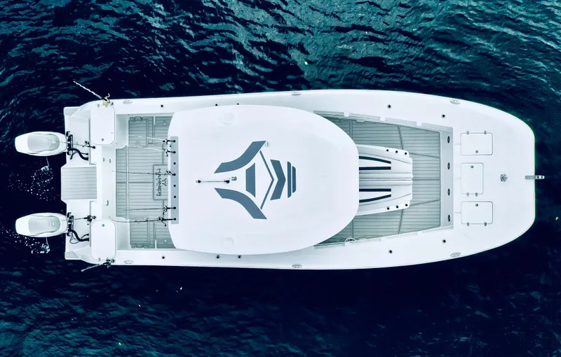 Slide: The Image of Top view of 2025 Hammer Yachts HammerCat 35 on water, showcasing sleek design and twin engines. - 8