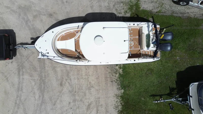 Slide: The Image of Aerial view of a 2015 Pursuit S 280 Sport boat on a trailer. - 8