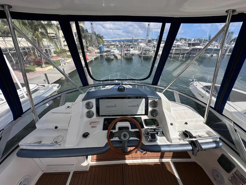 Slide: The Image of Interior view of 2007 Sea Ray 360 Sedan Bridge yacht cockpit with navigation equipment. - 10