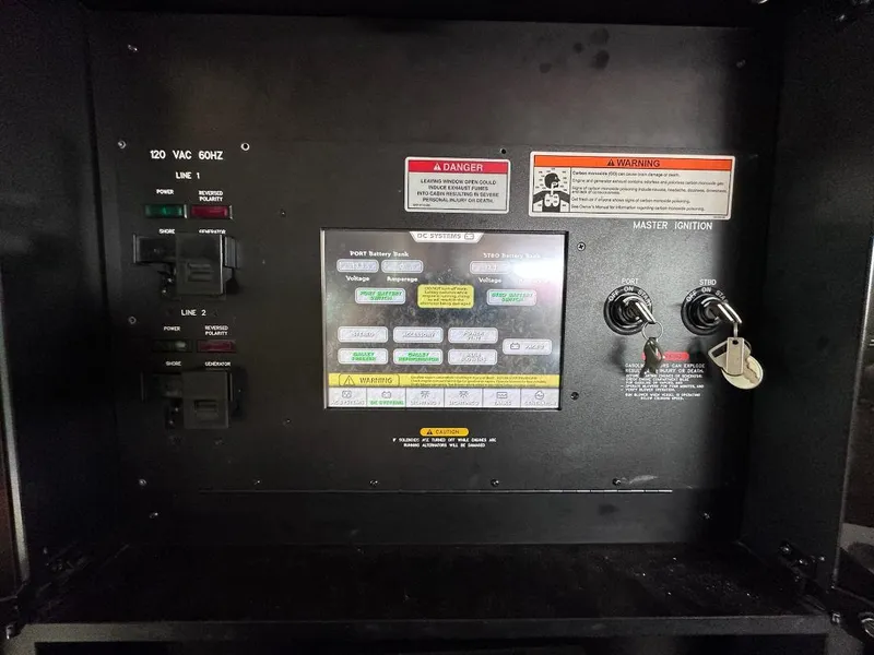 Slide: The Image of Electrical control panel of a 2007 Sea Ray 360 Sedan Bridge boat. - 13