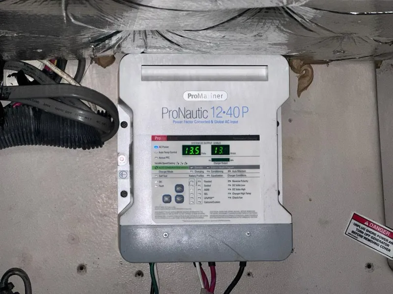 Slide: The Image of ProNautic 12-40P marine battery charger in 2007 Sea Ray 360 Sedan Bridge. - 24