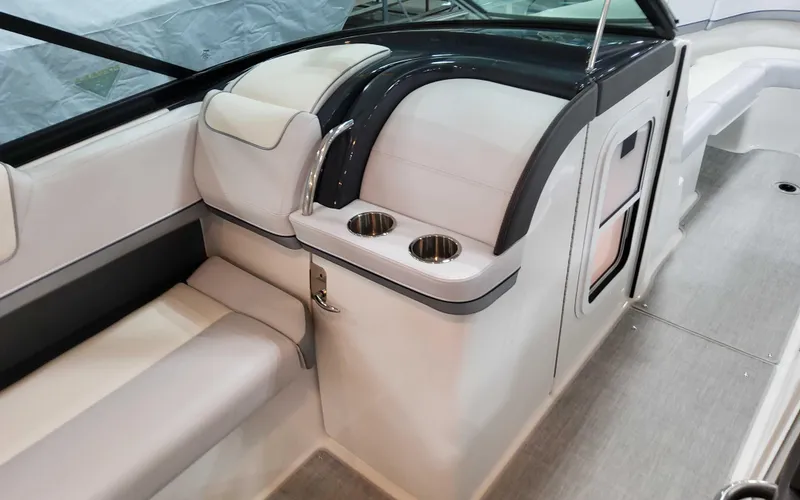 Slide: The Image of 2025 Formula 310 Bowrider interior with seating and cup holders. - 19