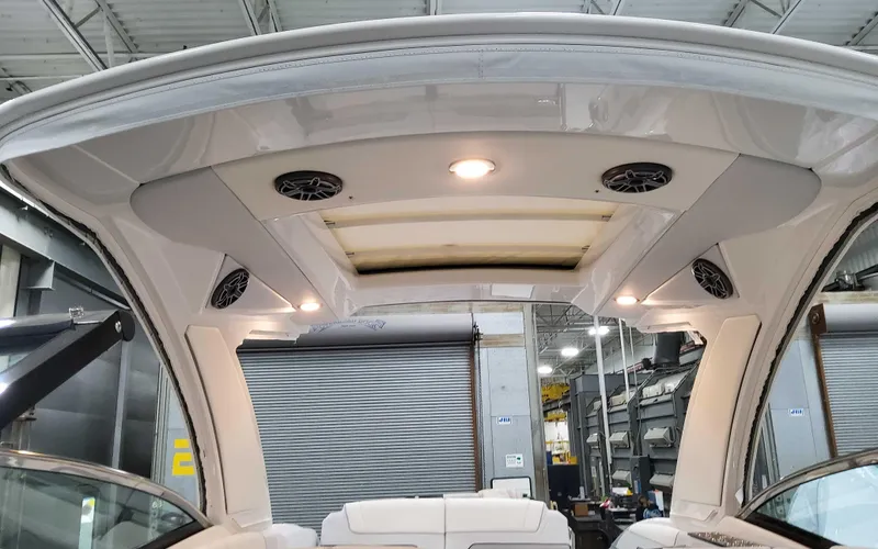 Slide: The Image of 2025 Formula 310 Bowrider interior roof with speakers and lighting. - 26