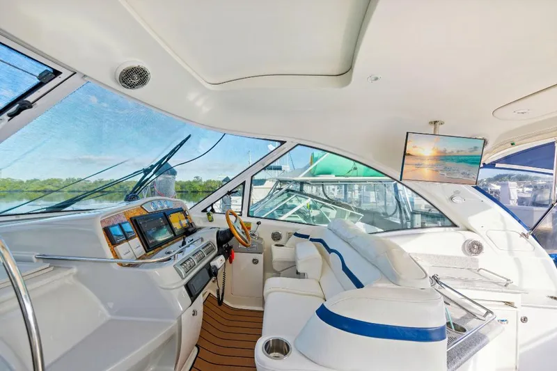 Slide: The Image of Interior of 2007 Formula 45 Yacht with modern dashboard and luxurious seating. - 12