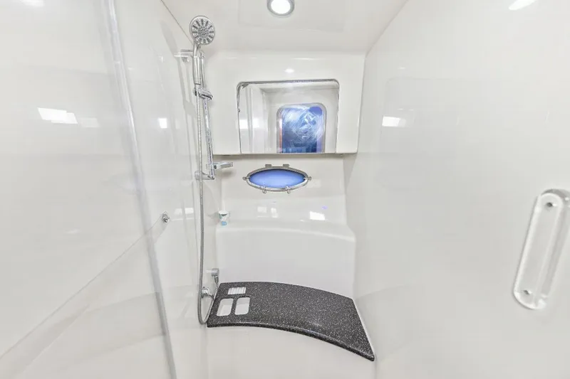 Slide: The Image of 2007 Formula 45 Yacht bathroom with shower, porthole, and modern fixtures. - 14