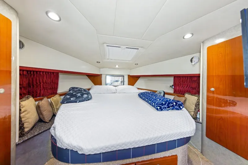 Slide: The Image of Luxurious 2007 Formula 45 Yacht cabin with cozy bed and elegant decor. - 15