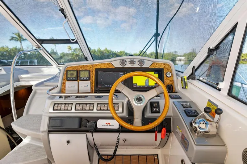 Slide: The Image of 2007 Formula 45 Yacht helm with advanced navigation and control systems. - 16