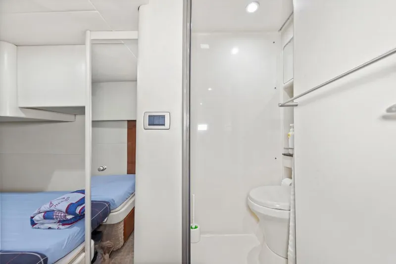 Slide: The Image of 2007 Formula 45 Yacht interior with bathroom and cozy sleeping area. - 9