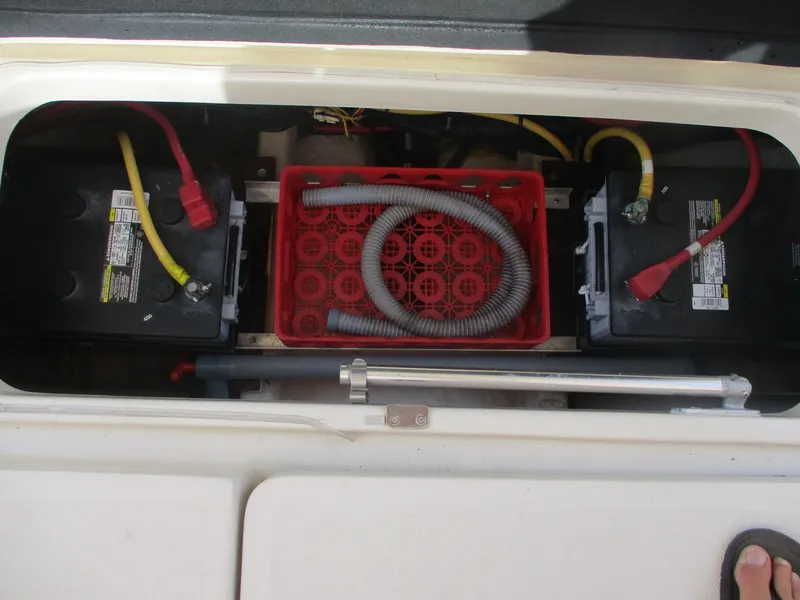 Slide: The Image of Battery compartment of a 2007 Mainship Pilot 34 Sedan with wiring and ventilation hose. - 20