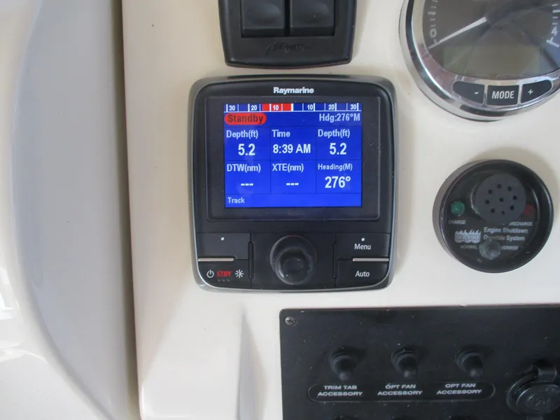 Slide: The Image of Raymarine navigation display on 2007 Mainship Pilot 34 Sedan boat dashboard. - 6