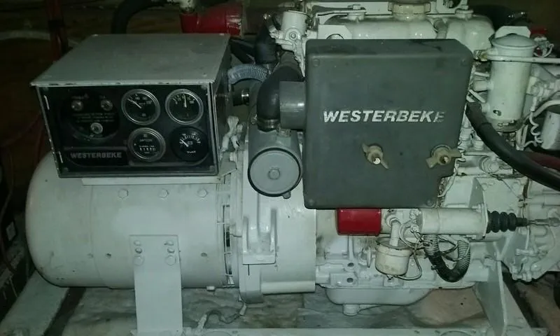 Slide: The Image of Westerbeke engine with control panel, 1984 model, featuring gauges and components. - 27