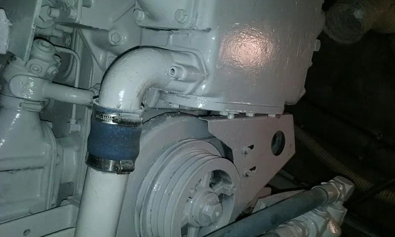 Slide: The Image of 1984 Post Convertible engine detail, showcasing mechanical components and piping. - 29