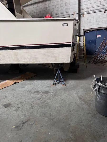 Slide: The Image of 1984 Post Convertible boat in garage, must sell, great deal. - 34