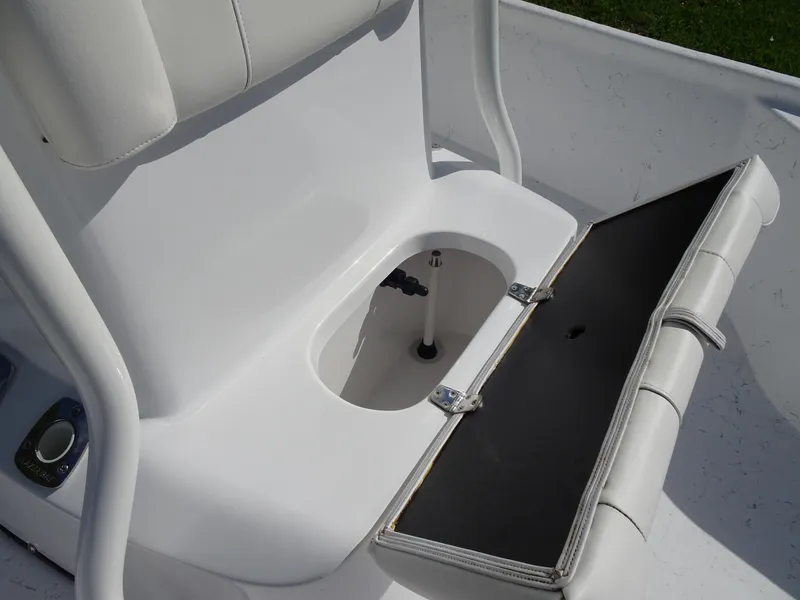 Slide: The Image of 2019 Blazer Bay 2400 boat seat with open storage compartment. - 16