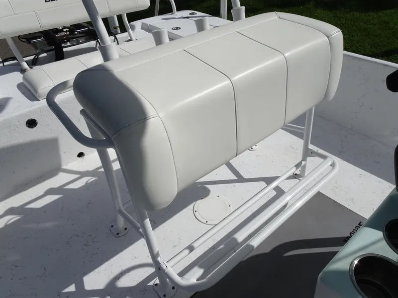 Slide: The Image of 2019 Blazer Bay 2400 boat seat with white cushioned bench and sturdy frame. - 17