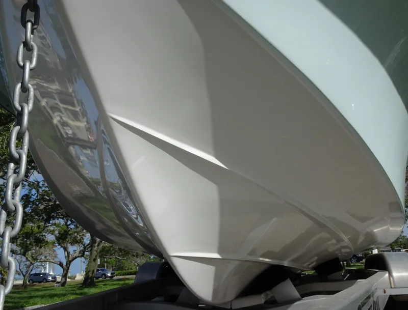 Slide: The Image of 2019 Blazer Bay 2400 boat hull on trailer, showcasing sleek design and craftsmanship. - 9