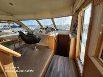 Slide: The Image of Electric stovetop with four burners in a Navigator 4800 CLASSIC, 1999 model. - 11