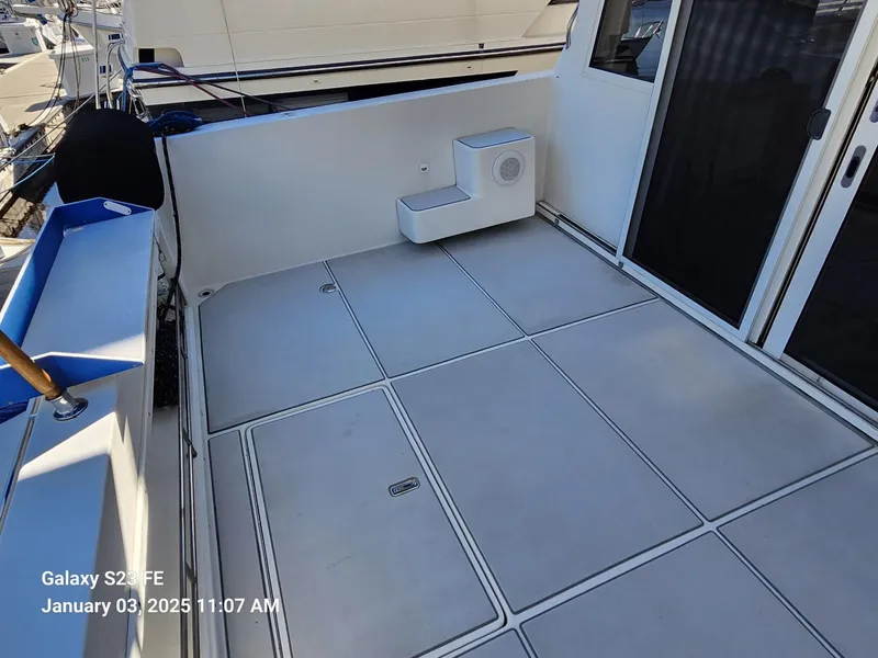 Slide: The Image of 1999 Navigator 4800 CLASSIC yacht bathroom with wood accents and modern fixtures. - 25
