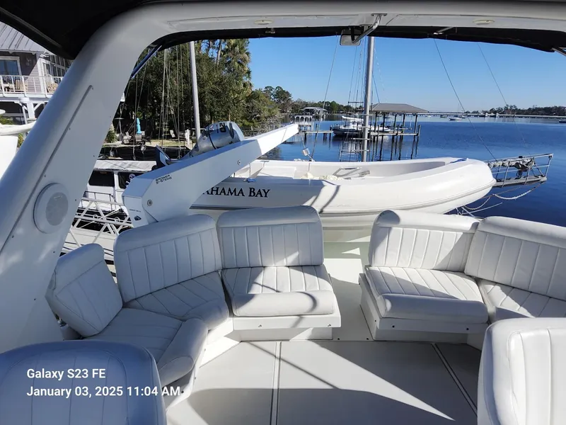 Slide: The Image of Cockpit of 1999 Navigator 4800 CLASSIC yacht with steering wheel and controls. - 35