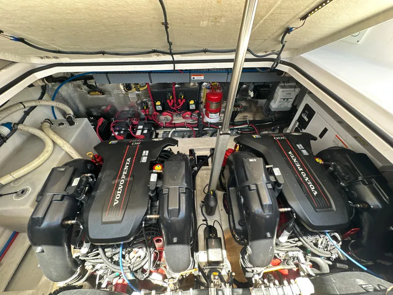 Slide: The Image of Engine compartment of a 2015 Regal 32 Express boat with dual Volvo Penta engines. - 28