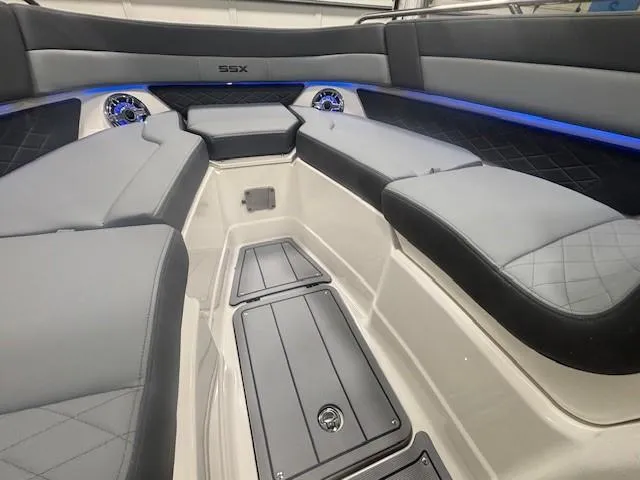 Slide: The Image of 2025 Chaparral 2870 SSX boat interior with sleek seating and modern design. - 13