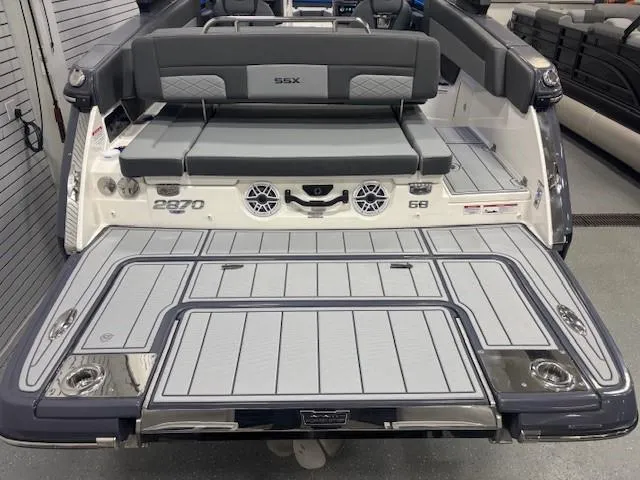 Slide: The Image of 2025 Chaparral 2870 boat with sleek design, spacious seating, and modern features. - 29