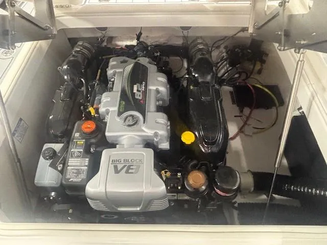 Slide: The Image of 2025 Chaparral 2870 engine compartment featuring a powerful V8 big block engine. - 30
