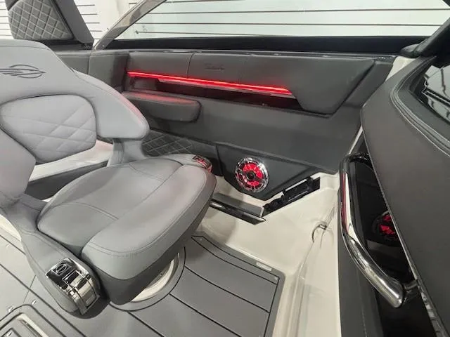 Slide: The Image of Interior of 2025 Chaparral 2870 boat with modern seating and red LED lighting. - 39