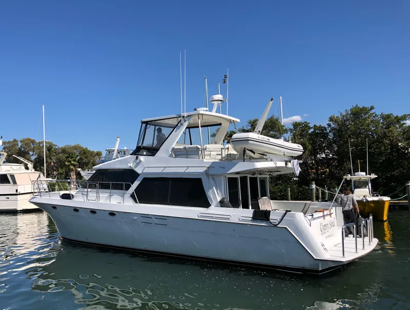 Slide: The Image of 1998 Navigator 53 Classic yacht docked on a sunny day. - 3