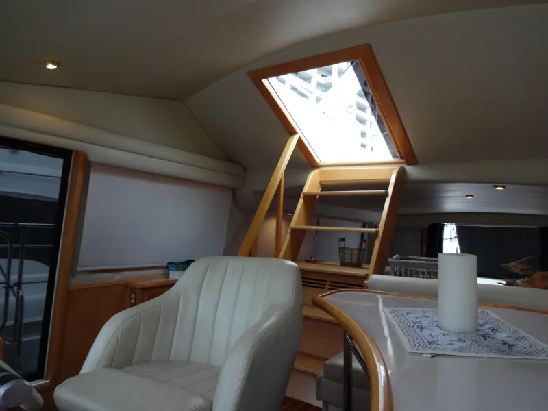 Slide: The Image of Interior of 1998 Navigator 53 Classic yacht with skylight and seating area. - 30