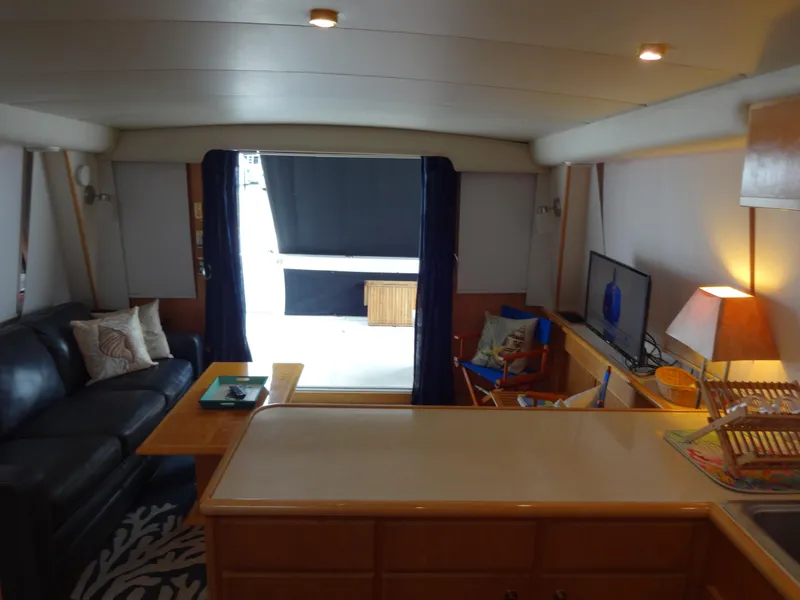 Slide: The Image of Interior of 1998 Navigator 53 Classic yacht with cozy seating and modern amenities. - 31