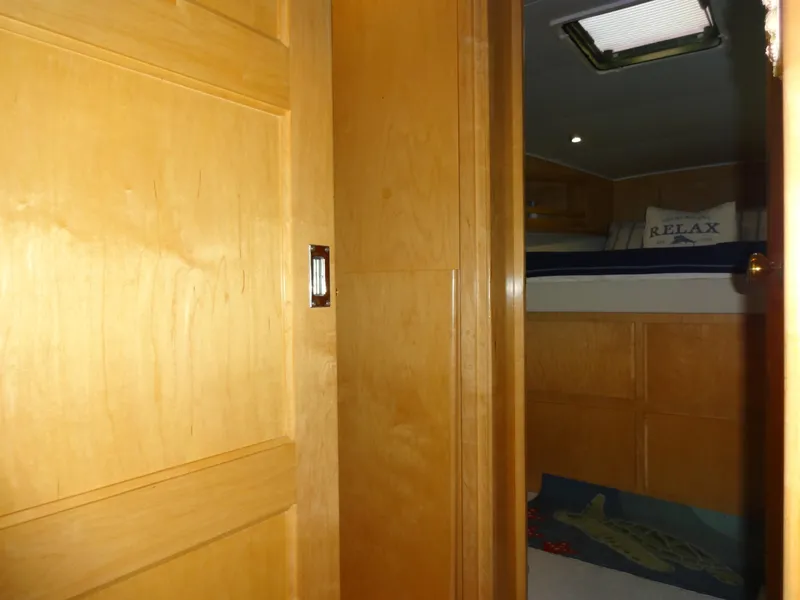 Slide: The Image of Interior of 1998 Navigator 53 Classic yacht with wooden door and cozy cabin. - 36