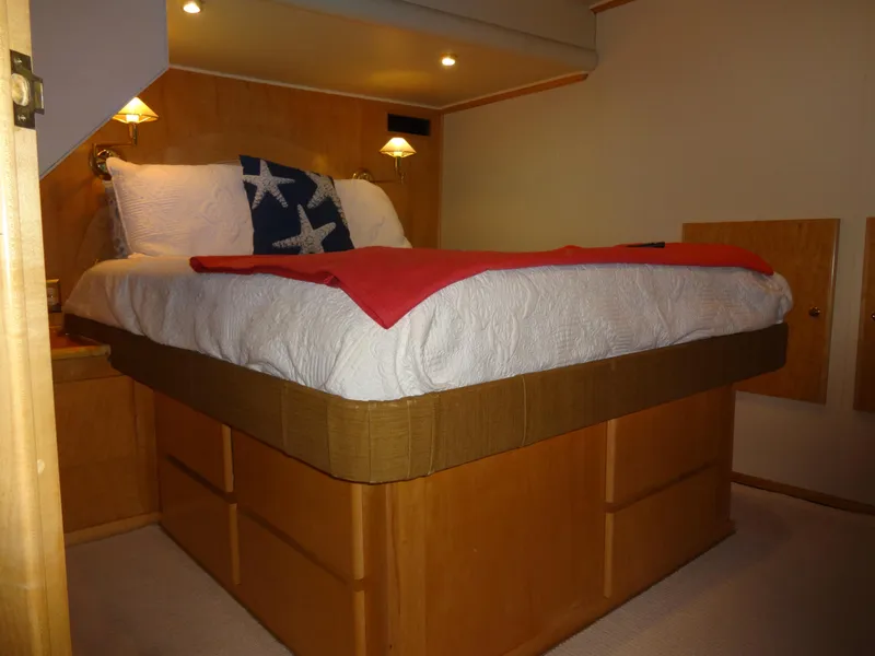 Slide: The Image of Cozy bedroom in 1998 Navigator 53 Classic yacht with starfish pillows and warm lighting. - 38