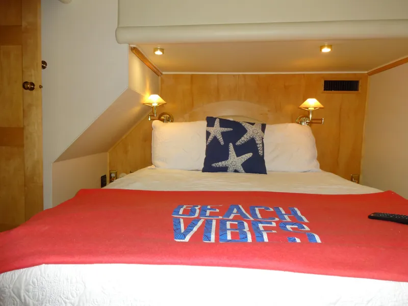 Slide: The Image of Cozy bedroom in 1998 Navigator 53 Classic yacht with beach-themed decor. - 39