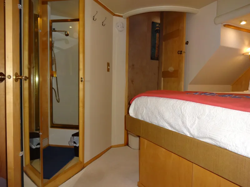 Slide: The Image of Interior of 1998 Navigator 53 Classic yacht with bed and shower area. - 40