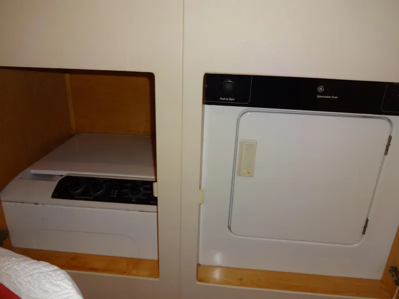 Slide: The Image of Laundry area with washer and dryer in 1998 Navigator 53 Classic yacht. - 42