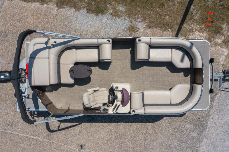 Slide: The Image of 2016 Misty Harbor 2285CS Biscayne Bay pontoon boat, aerial view, beige seating arrangement. - 16