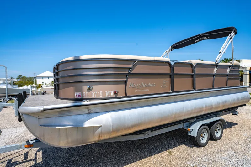 Slide: The Image of 2016 Misty Harbor 2285CS Biscayne Bay pontoon boat on trailer, sunny day. - 6