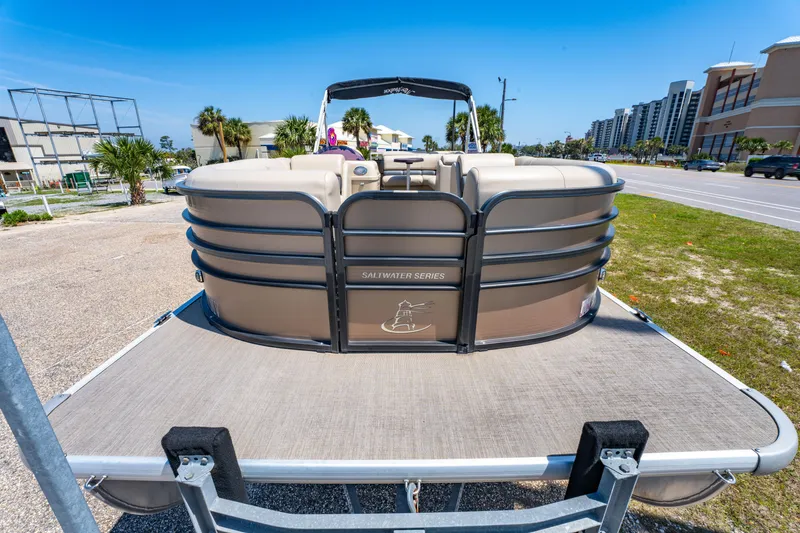 Slide: The Image of 2016 Misty Harbor 2285CS Biscayne Bay pontoon boat on trailer, sunny day, urban background. - 7