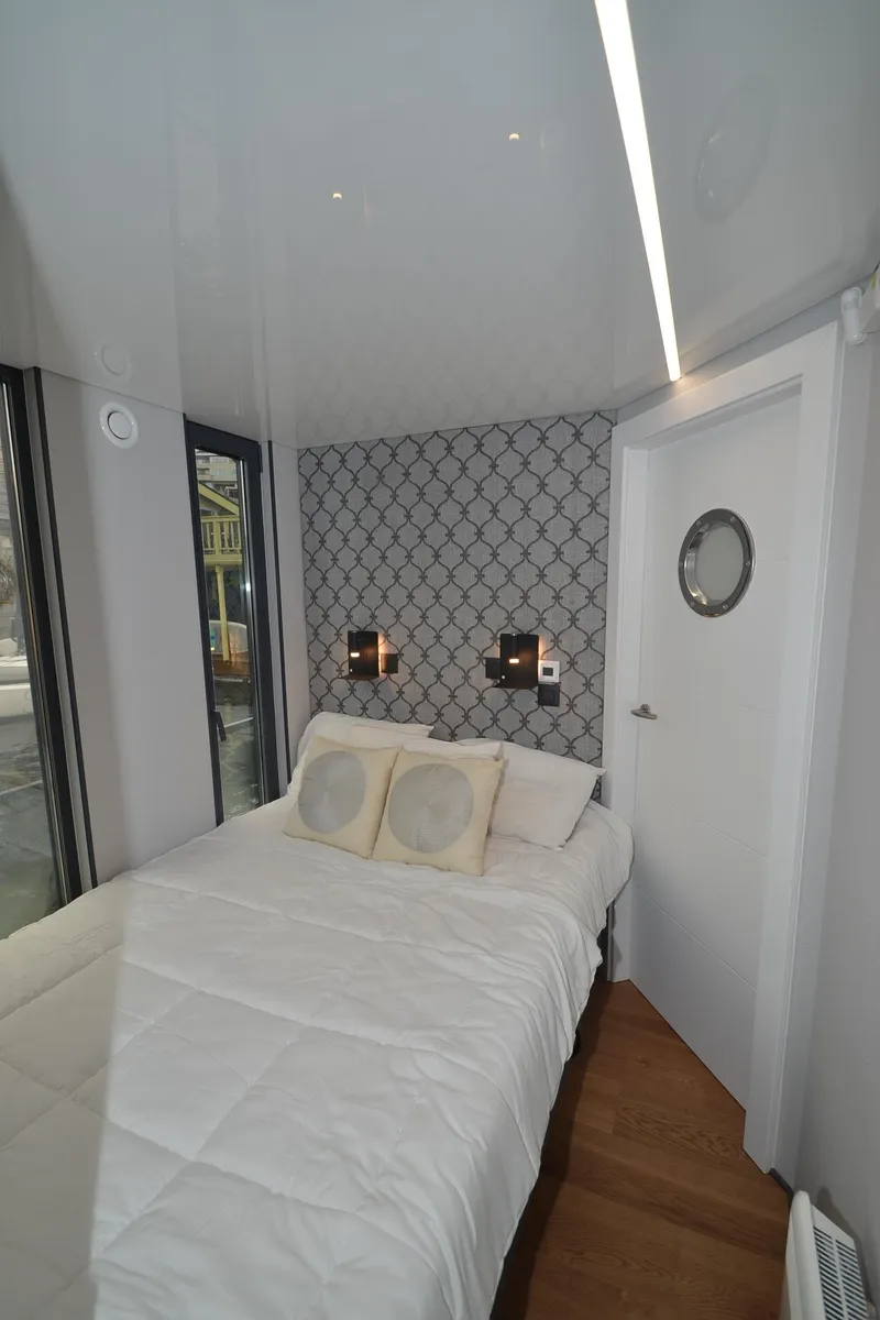 Slide: The Image of 2024 La Mare Modern 11 interior with cozy bed and stylish decor. - 27
