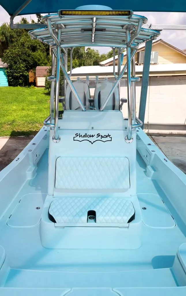 Slide: The Image of 2023 Shallow Sport 28 X3 boat with sleek design and spacious deck. - 17