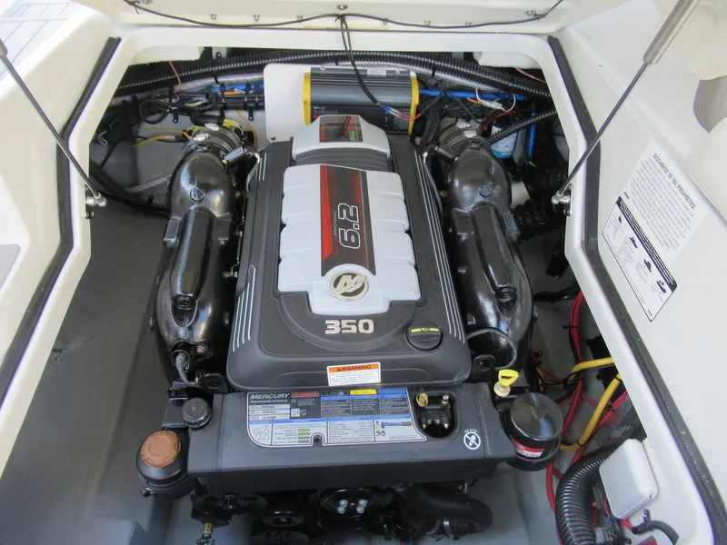 Slide: The Image of 2019 Crownline 285SS boat engine compartment with Mercury 6.2L 350 HP engine. - 21
