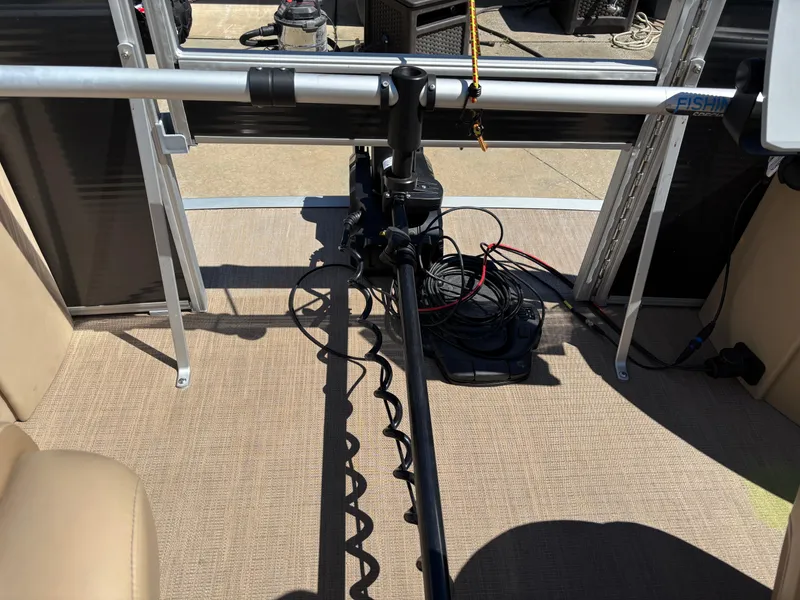 Slide: The Image of 2018 Bennington 21 SFX boat interior with fishing rod holder and equipment. - 4
