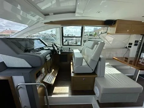 Slide: The Image of 2018 Cruisers Yachts 42 Cantius interior with modern helm and seating area. - 24