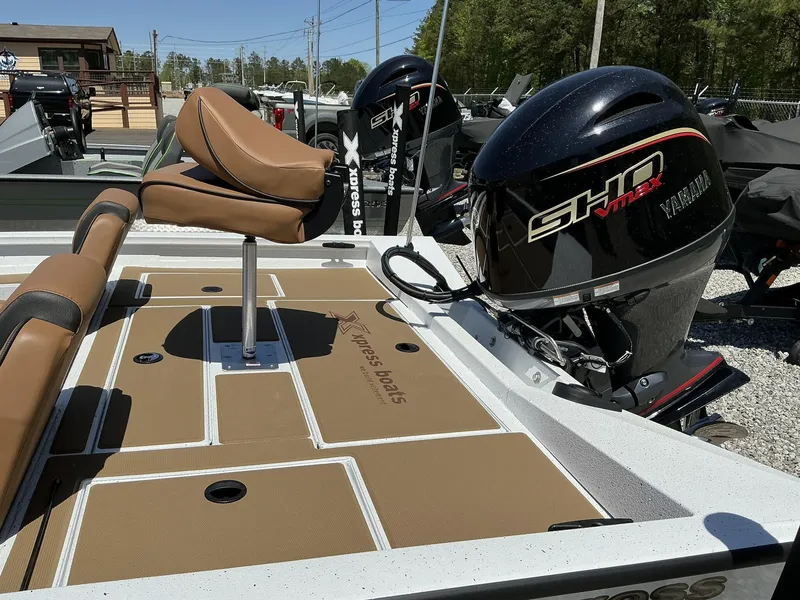 Slide: The Image of 2025 Xpress Hyper-Lift Series H18 bass boat with Yamaha SHO engine, brown seating. - 5