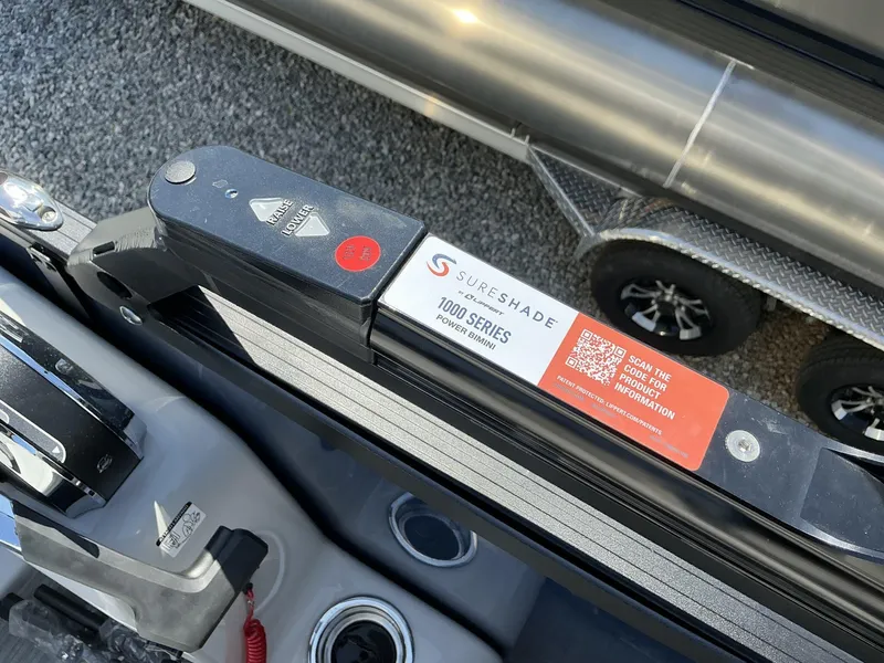 Slide: The Image of 2025 Lowe SS230 boat with SureShade 1000 Series power bimini control panel. - 10