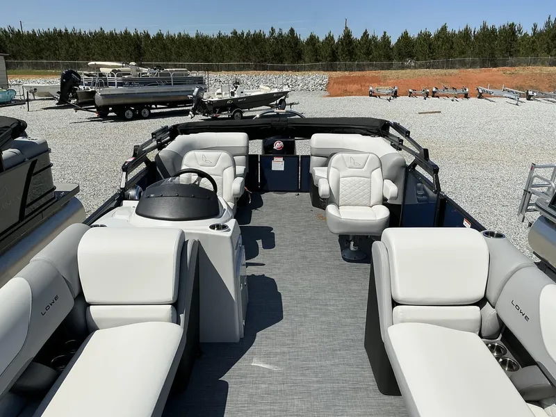 Slide: The Image of 2025 Lowe SS230 pontoon boat with spacious seating and modern design. - 5